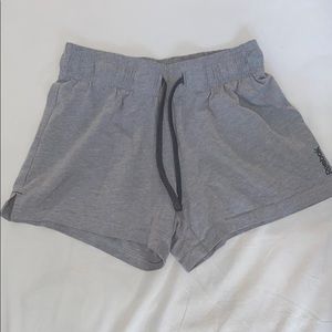 Grey athletic shorts from Reebok